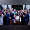 US President Donald Trump displays the signed bill during a ceremony for the One Big Beautiful Bill Act on the South Lawn of the White House in Washington on July 4 US President Donald Trump displays the signed bill during a ceremony for the One Big Beautiful Bill Act on the South Lawn of the White House in Washington on July 4