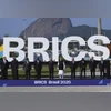Leaders attending the 17th annual BRICS summit pose for a group photo in Rio de Janeiro, Sunday, July 6, 2025