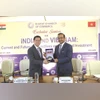 Vietnam’s Ambassador to India Nguyen Thanh Hai (left) with Naresh Pachisia, Bharat Chamber of Commerce president, at an event in Kolkata on Monday.