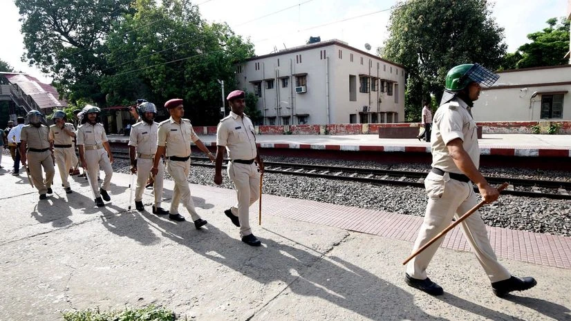 Police personnel keep vigil amid 'Bihar bandh' at Sachiwalay Halt Railway station in Patna, Bharat Bandh, strike , protest, July 9