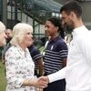 Queen Camilla visits Wimbledon and watches QF matches at Centre Court