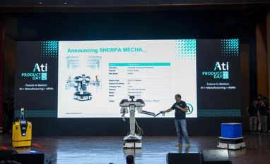 humanoid, Ati motors, Sherpa mecha, Indian humanoids Sherpa Mecha, Mecha’, a humanoid-inspired robot, that pushes the boundaries of robotics research, doing a Handshake with Ati Motors' CEO Saurabh Chandra.