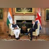 Britain's Prime Minister Keir Starmer welcomes Indian Prime Minister Narendra Modi at Chequers near Aylesbury
