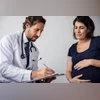 IVF pregnant woman with doctor