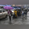 Mumbai braces for more rain as IMD issues alerts; trains, flights hit