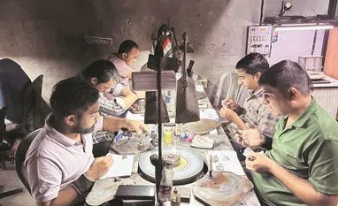 Workers at a diamond unit in Surat, the world's hub for diamond finishing photo:Ajinkya Kawale Workers at a diamond unit in Surat, the world’s hub for diamond finishing photo:Ajinkya Kawale