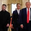U.S. President Donald Trump, Ukrainian President Volodymyr Zelenskiy and Finland's President Alexander Stubb walk during a meeting, amid negotiations to end the Russian war in Ukraine, at the White House in Washington, D.C., U.S., August 18, 2025  RE