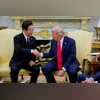 U.S. President Donald Trump shakes hands with South Korean President Lee Jae Myung at the Oval Office, at the White House, in Washington, D.C., U.S., August 25, 2025. REUTERS