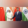 PM Modi, Xi Jinping PM Modi shaking hands with Xi Jinping