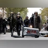French police detain 295 in clashes as Macron appoints new prime minister