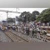 Ranchi: Security personnel keep vigil during a rail blockade by protestors under the banner of Adivasi Kurmi Samaj, demanding Scheduled Tribe status, at Muri railway station, in Ranchi | PTI