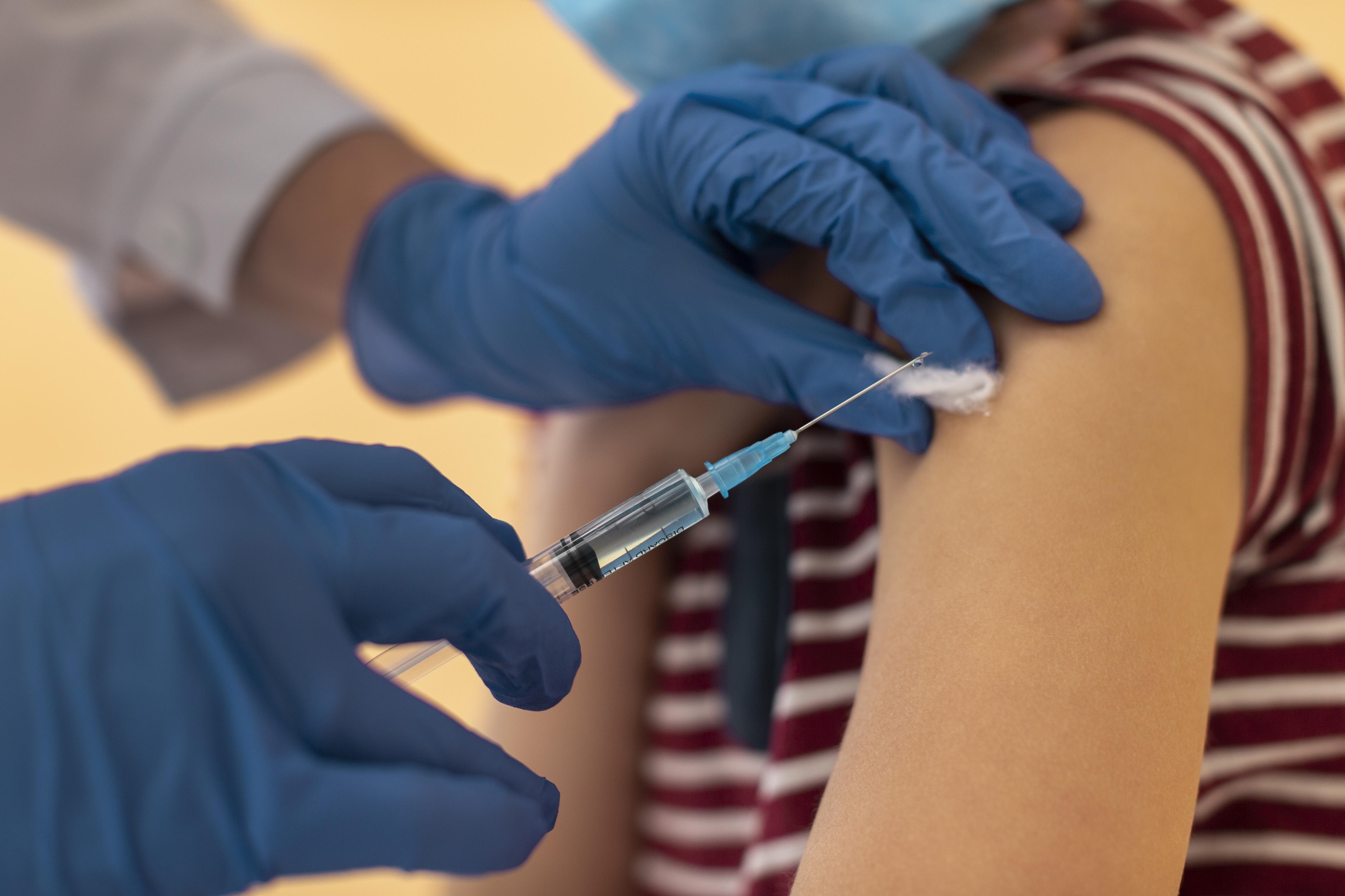 Trump signs order to narrow childhood vaccine schedule, split MMR shot