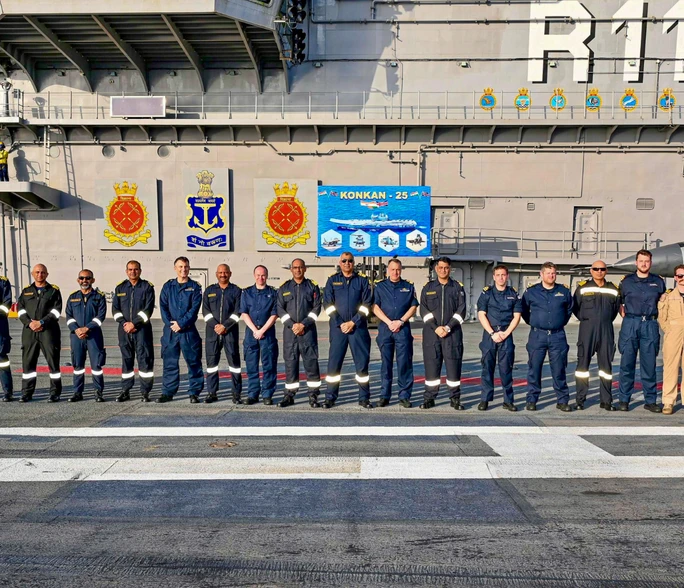 Indian Navy's Flag Officer Commanding Western Fleet (FOCWF) Rear Admiral Vivek Dahiya with Royal Navy's (UK) Carrier Strike Group Commodore James Blackmore and other officials during the Exercise Konkan (Photo: PTI) Indian Navy's Flag Officer Commanding Western Fleet (FOCWF) Rear Admiral Vivek Dahiya with Royal Navy's (UK) Carrier Strike Group Commodore James Blackmore and other officials during the Exercise Konkan (Photo: PTI)