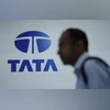 Govt urges Tatas to resolve boardroom dispute to maintain group stability A man walks past the logo of TATA at its exhibitor stall at the India Mobile Congress 2025 at Yashobhoomi a convention and expo center in New Delhi, India, October 8, 2025| REUTERS