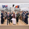 In this image posted on Oct. 9, 2025, Defence Minister Rajnath Singh received by Australia Defence Assistant Minister Peter Khalil on his arrival at Royal Australian Air Force Base, in Canberra, Australia. (@rajnathsingh/X via PTI Photo)