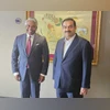 Gautam Adani, Thomas Kurian