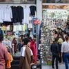 Shoppers in front of clothing store in the suburb of Bandra in Mumbai