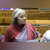 Union Finance Minister Nirmala Sitharaman speaks during the first day of the Winter Session of Parliament, in New Delhi, Monday, Dec. 1, 2025. (Sansad TV via PTI Photo) Union Finance Minister Nirmala Sitharaman speaks during the first day of the Winter Session of Parliament, in New Delhi, Monday, Dec. 1, 2025. (Sansad TV via PTI Photo)