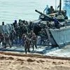 Soldiers disembark from the Indian Navy's landing craft during a tri-services military drill in Porbandar, Gujarat, on November 13, 2025 (Photo: Reuters)