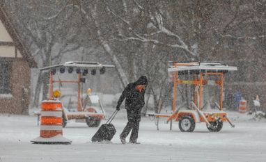 A pedestrian during a snowstorm in Chicago on Nov. 29 A pedestrian during a snowstorm in Chicago on Nov. 29