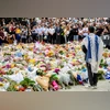 A member of the Jewish community stands at a floral memorial in honour of the victims of the mass shooting targeting a Hanukkah celebration on Sunday, at Bondi Beach | REUTERS A member of the Jewish community stands at a floral memorial in honour of the victims of the mass shooting targeting a Hanukkah celebration on Sunday, at Bondi Beach | REUTERS