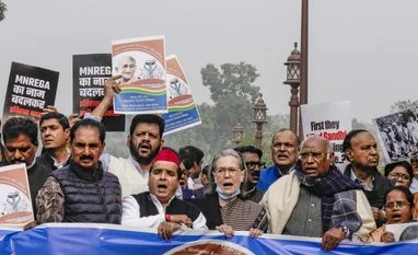 Oppn sits on overnight protest in Parl against passage of G RAM G bill Leader of Opposition in the Rajya Sabha Mallikarjun Kharge, front second right, Congress MP Sonia Gandhi, centre, DMK MP TR Baalu, back right, and other opposition members | PTI