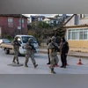 Turkish gendarmerie special forces team leaves the site where Turkish security forces launched an operation on a house believed to contain suspected Islamic State militants | REUTERS Turkish gendarmerie special forces team leaves the site where Turkish security forces launched an operation on a house believed to contain suspected Islamic State militants | REUTERS