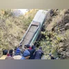 Almora: People gather around a damaged bus which fell-off a deep gorge, in Almora district, Uttarakhand, Tuesday | (PTI Photo) Almora: People gather around a damaged bus which fell-off a deep gorge, in Almora district, Uttarakhand, Tuesday | (PTI Photo)