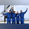 Jeff Bezos (second from left) with fellow passengers after flying into space in the Blue Origin New Shepard rocket on July 20, 2021 Jeff Bezos (second from left) with fellow passengers after flying into space in the Blue Origin New Shepard rocket on July 20, 2021