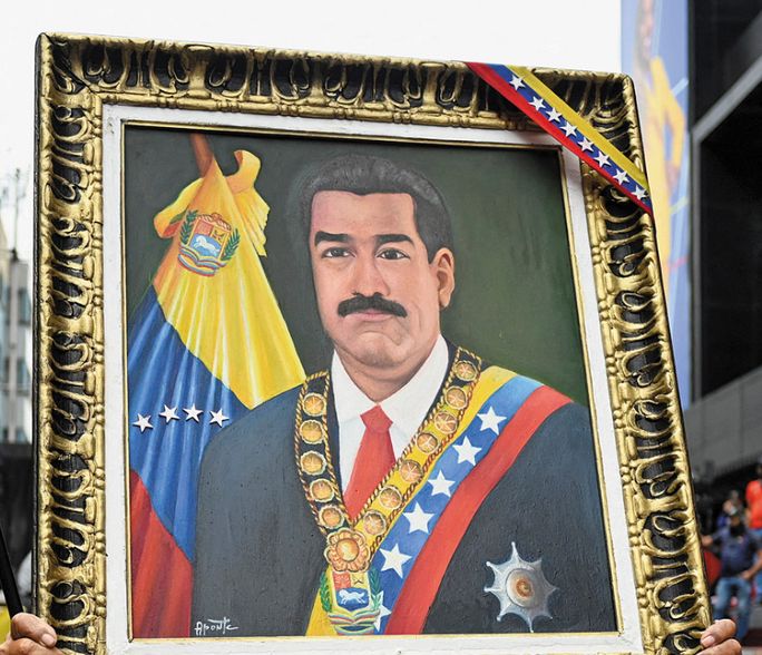 A demonstrator holds a portrait of Venezuelan President Nicolas Maduro to demand his release following his capture by US forces, in Caracas on January 15, 2026 (Photo: Reuters) A demonstrator holds a portrait of Venezuelan President Nicolas Maduro to demand his release following his capture by US forces, in Caracas on January 15, 2026 (Photo: Reuters)