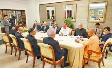 UP CM holds meetings with top Singapore investment-focused business groups Yogi Adityanath, Singapore, UP CM, meeting