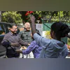 AAP national convener Arvind Kejriwal and party leader Manish Sisodia celebrate with family members after a Delhi court discharged them in an excise policy-related corruption case, refusing to take cognisance of the CBI chargesheet, in New Delhi. (AA AAP national convener Arvind Kejriwal and party leader Manish Sisodia celebrate with family members after a Delhi court discharged them in an excise policy-related corruption case, refusing to take cognisance of the CBI chargesheet, in New Delhi. (AA
