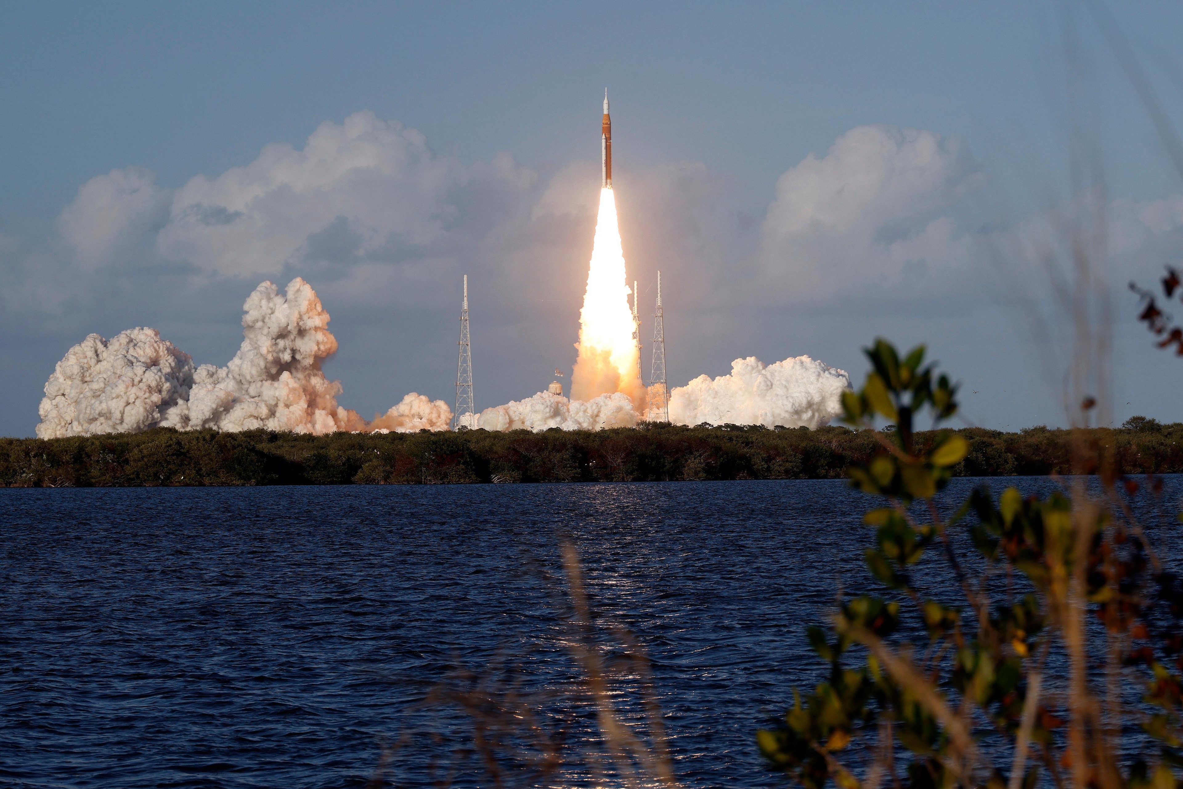 Artemis II crew make call to space station as they head home from moon