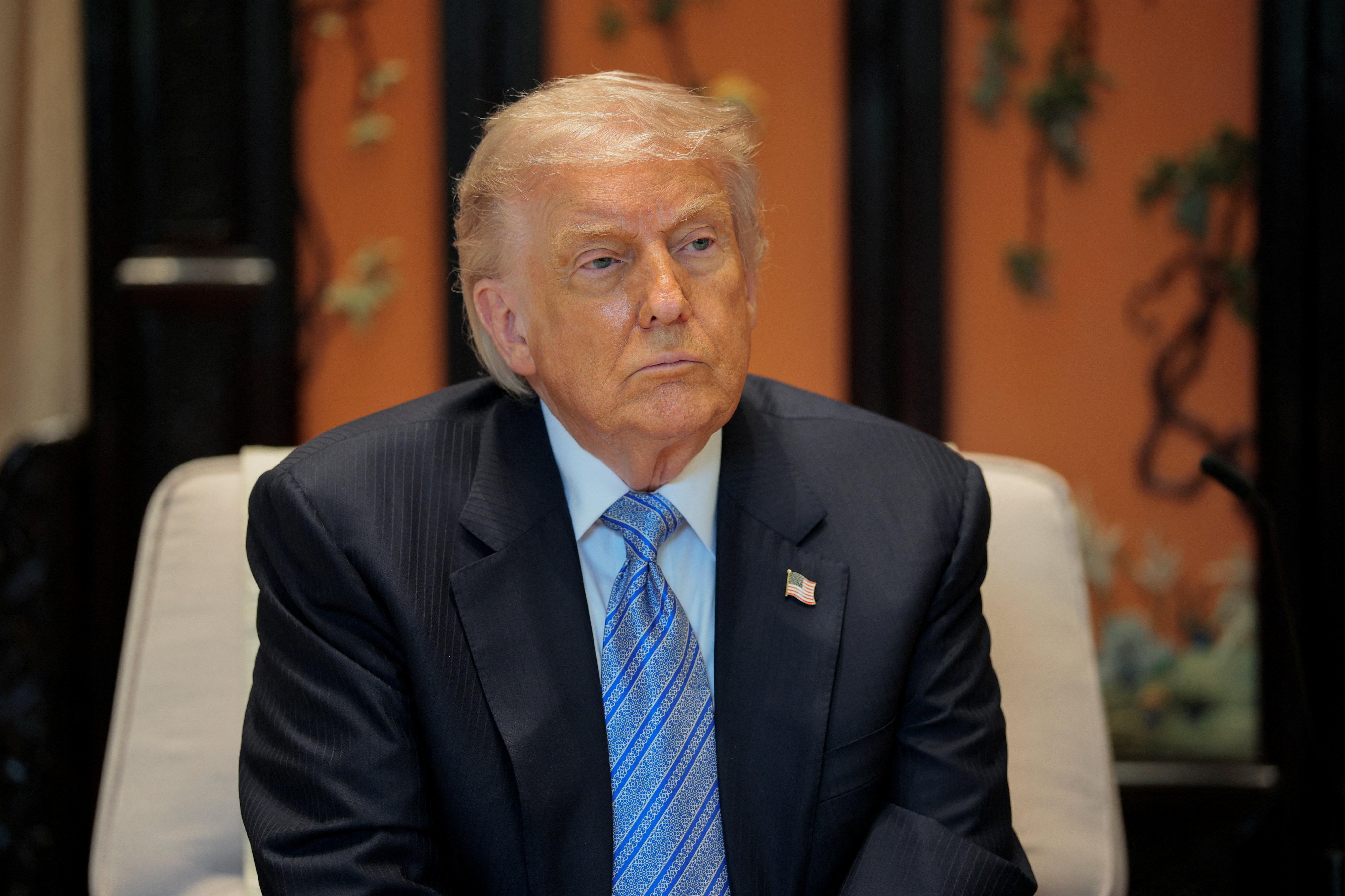 Trump discloses thousands of stock trades in cos influenced by his policies