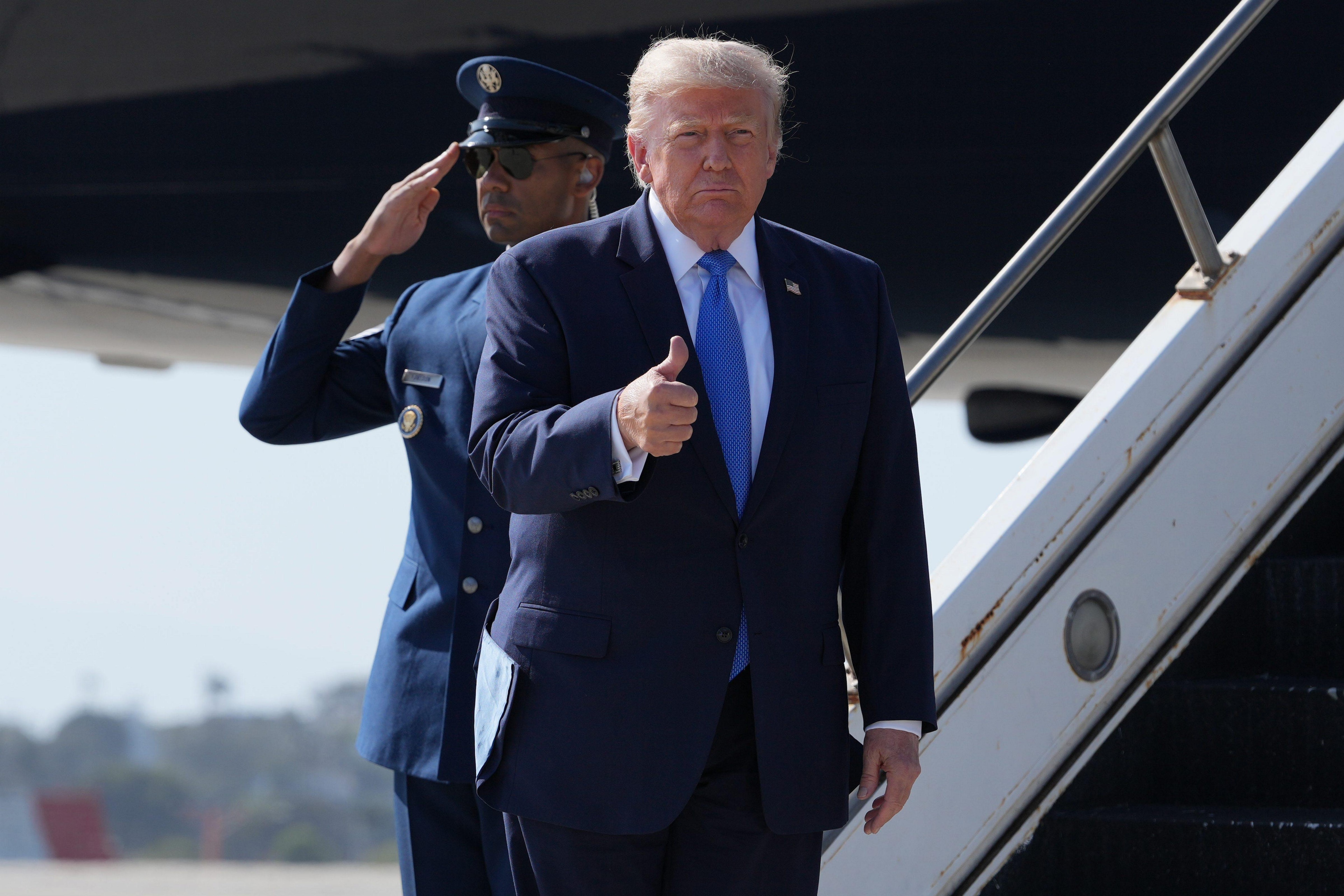 Trump sued over paid early access to US policy posts on Truth Social