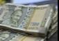 Rupee closes at fresh low of 95.31 per dollar amid oil price surge