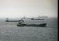 Iran missiles reportedly hit 2 ships in Strait of Hormuz, testing US talks