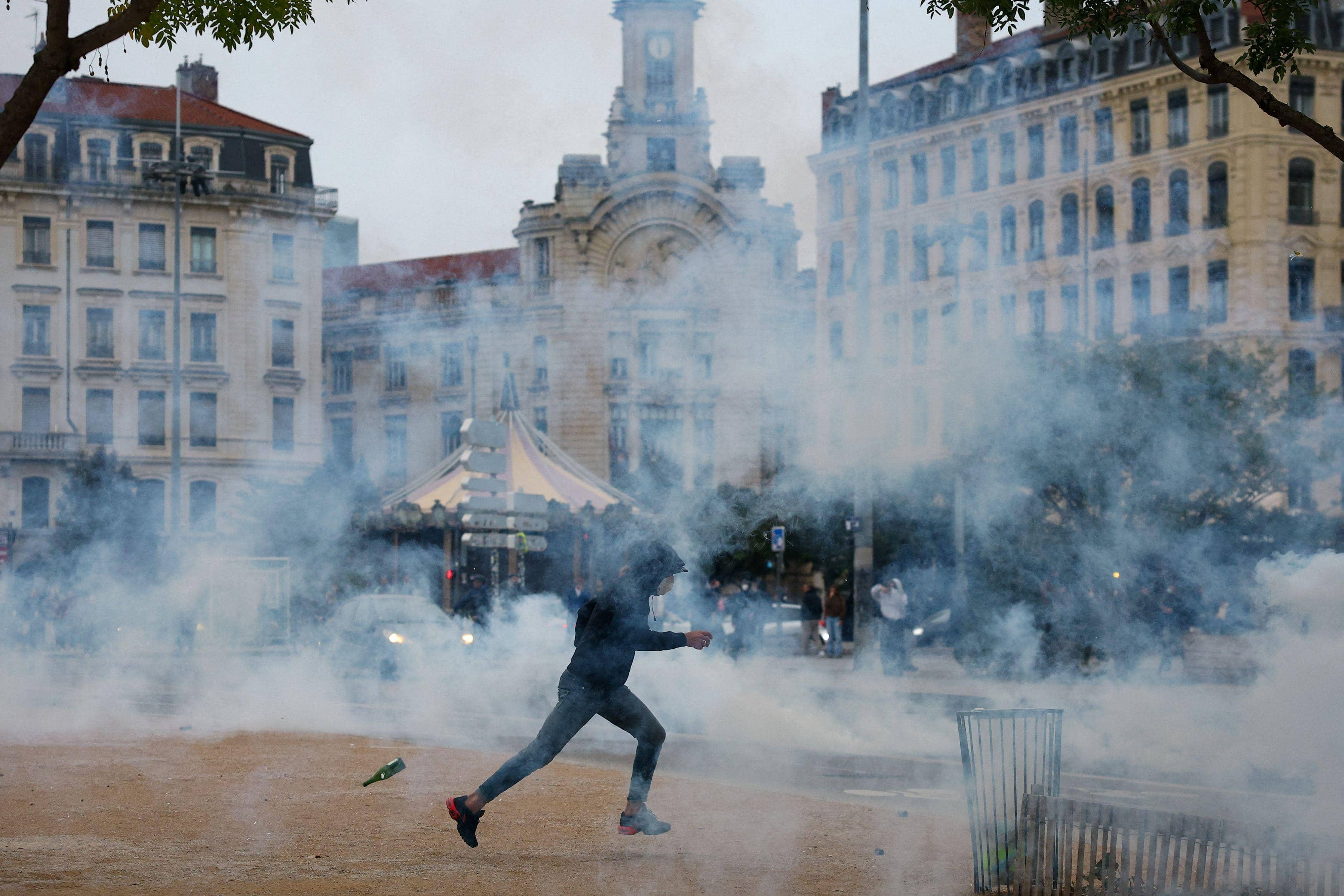 Police, protesters clash in Paris as 410,000 demonstrate across France