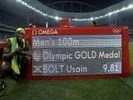 Jamaica's Usain Bolt poses beside the timing panel after winning the gold medal in the men's 100-meter final during the athletics competitions in the Olympic stadium of the 2016 Summer Olympics in Rio de Janeiro, Brazil. Jamaica's Usain Bolt poses beside the timing panel after winning the gold medal in the men's 100-meter final during the athletics competitions in the Olympic stadium of the 2016 Summer Olympics in Rio de Janeiro, Brazil.