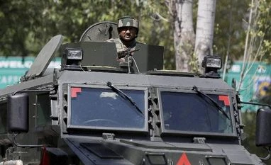 An army soldier guards the army base which was attacked by suspected rebels in Uri, in Jammu and Kashmir. An army soldier guards the army base which was attacked by suspected rebels in Uri, in Jammu and Kashmir.