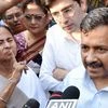 Delhi Chief Minister Arvind Kejriwal and West Bengal Chief Minister Mamata Banerjee talking to media  at a dharna against demonetisation of currency notes, in front of Reserve Bank of India in New Delhi