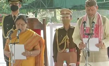 Tirath Singh Rawat takes oath as Uttarakhand chief minister Tirath Singh Rawat
