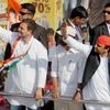 Congress vice-president Rahul Gandhi and Uttar Pradesh Chief Minister Akhilesh Yadav during a road show campaign in Allahabad on Tuesday.