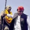 Uttar Pradesh Chief Minister Akhilesh Yadav paying tribute to Mahatma Gandhi during a road show campaign for Congress-SP alliance in Allahabad on Tuesday.