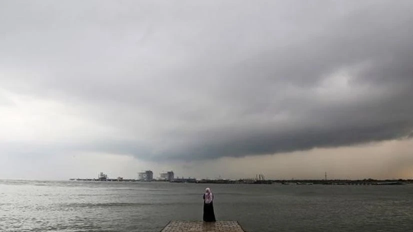 A woman stands on a seaside promenade against the background of pre-monsoon clouds gathered over the Arabian Sea in Kochi, India. (Photo: Reuters) A woman stands on a seaside promenade against the background of pre-monsoon clouds gathered over the Arabian Sea in Kochi, India. (Photo: Reuters)