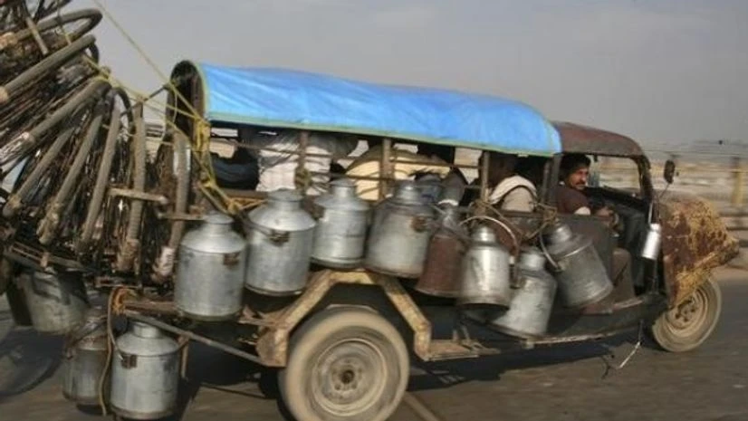File photo of a man driving a taxi loaded with bicycles and milk containers through a road in Allahabad on January 14, 2011. (Photo: Reuters) File photo of a man driving a taxi loaded with bicycles and milk containers through a road in Allahabad on January 14, 2011. (Photo: Reuters)