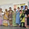 women line up to cast their ballot in Gujarat