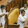 IUML MLA Parakkal Abdullah arrives in the Kerala Assembly, wearing a mask and gloves to seek attention of the house towards the outbreak of Nipah virus, in Thiruvananthapuram on Monday, June 04, 2018.