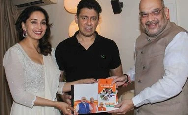 BJP mulls fielding Madhuri Dixit from Pune seat in 2019 elections BJP President Amit Shah meets Bollywood actress Madhuri Dixit and Sriram Nene at their Juhu residence, as a part of his 'Sampark Se Samarthan' campaign, in Mumbai on Wednesday, June 06, 2018.