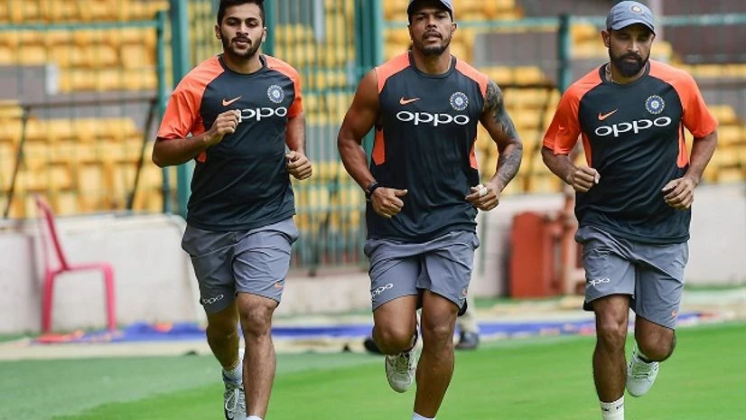Indian cricket team players Md Shami, Umesh Yadav and Shardul Thakur during a practice session ahead of their maiden cricket test match against Afghanistan, in Bengaluru on Monday, June 11, 2018. Indian cricket team players Md Shami, Umesh Yadav and Shardul Thakur during a practice session ahead of their maiden cricket test match against Afghanistan, in Bengaluru on Monday, June 11, 2018.